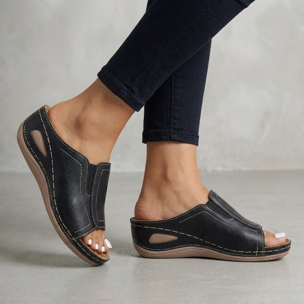 Alva dam slip-on sandaler i kol – öppen form för sommaren