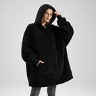 Närbild på mjuk plyschfleece-textur på oversized hoodie-filt