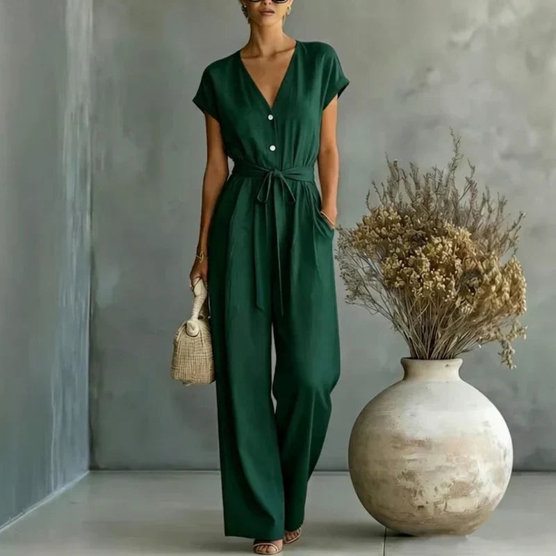 Grön jumpsuit för dam med flatterande V-ringning