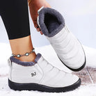 Lila dam vinterboots med slip-on-design och sidoelasticitet