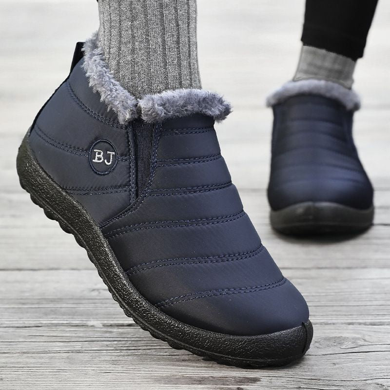 Bruna fleecefodrade vinterboots för dam – par visas framifrån